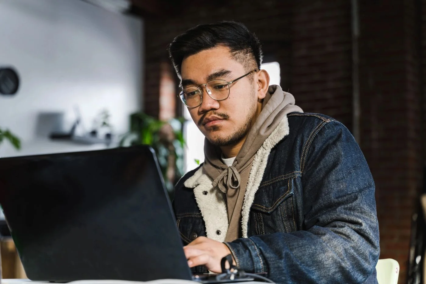 IT professional working at a laptop